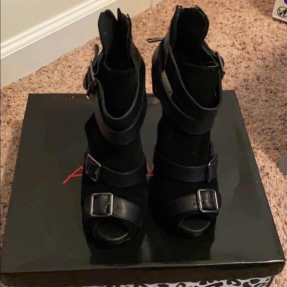 Black buckled heels